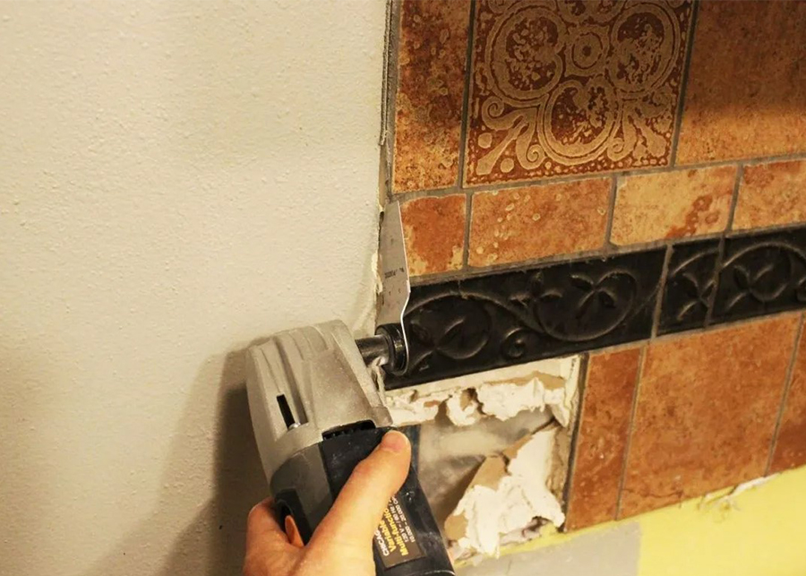 Do you have to replace drywall after removing tile?